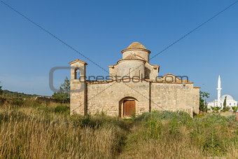 Panayia Kanakaria Monastery Church, Cyprus- mosque in background