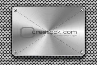 Polished metal plate with screws on grid, industrial background