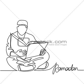 Man in fez reading Koran.
