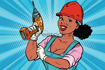 Woman professional. Construction worker with drill