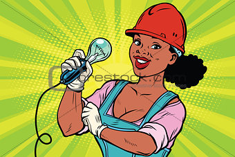 Construction worker with light bulb. Woman professional