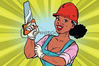 Construction worker with saw. Woman professional