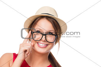 face of a young stylish girl on a white background closeup