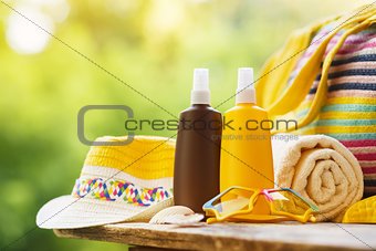 Sunscreen cosmetic and beach accessories