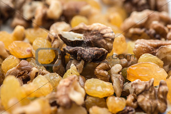 raisins and walnuts closeup background