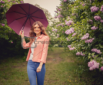 Girl with umbrella in park