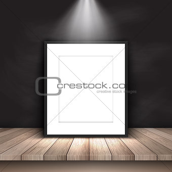 Blank picture leaning against chalkboard