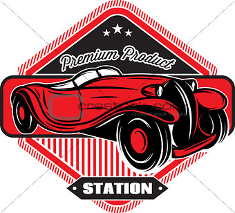 Black badge with red retro car and inscriptions