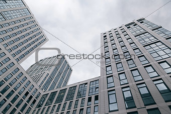 Glass, high rise buildings, taken from below. Office buildings