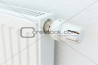 heating radiator against white wall