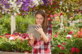 Gardener using tablet