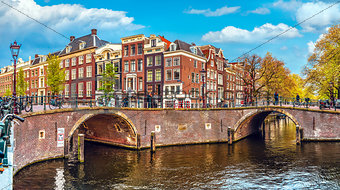 Channel in Amsterdam Netherlands houses river Amstel