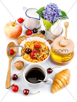 Breakfast top view fresh croissant coffee berry