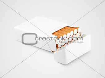 Open pack of cigarettes on gray