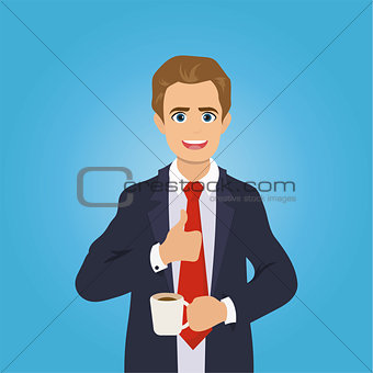 Businessman gives the thumbs up, drinking coffee
