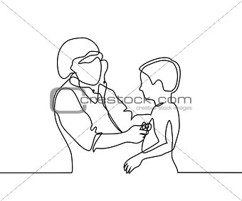 Doctor with stethoscope treat patient small boy