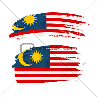 Grunge brush stroke with Malaysia national flag on white