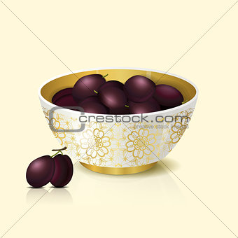 white bowl with plums shadow and reflection