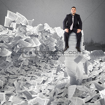 Businessman with paper sheet anywhere. Buried by bureaucracy concept.