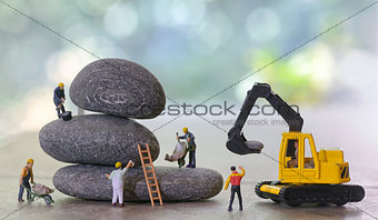 Pebbles stack and figurines