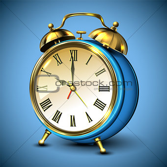 Metal retro style alarm clock on blue background.