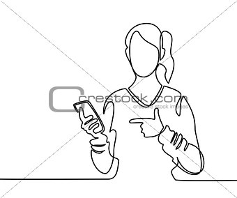 Woman holding mobile phone and pointing finger