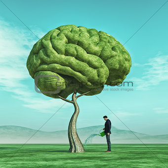 Man squirting a big tree shaped human brain