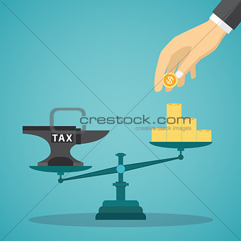Businessman use coin balancing with TAX on scales.