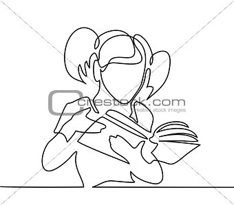 Girl reading book. Back to school concept.