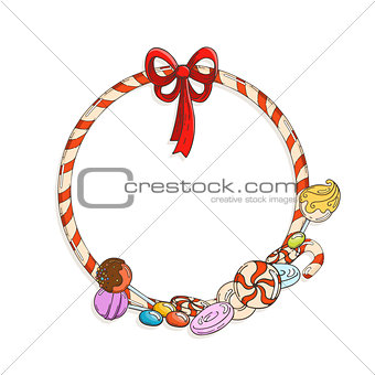 Frame of candy cane with candies and lollypops.
