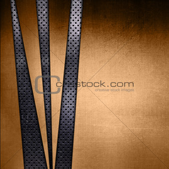 Abstract gold texture on a perforated metallic background