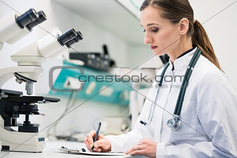 Doctor in the medical lab analyzing samples
