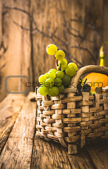 Fresh grapes on wood