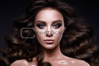 Beautiful young brunette with make-up