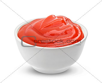 Ketchup in bowl isolated on white background
