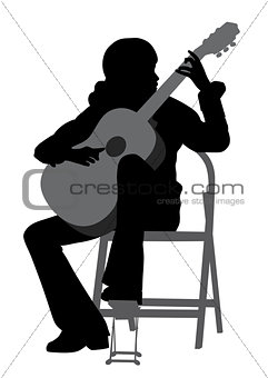 Young woman playing acoustic guitar
