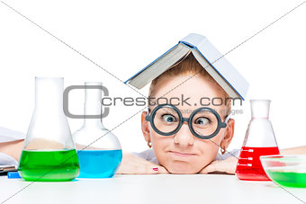 Close-up portrait of a cheerful chemist with test tubes on a tab