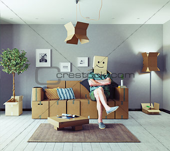 man in cardboard boxes design room