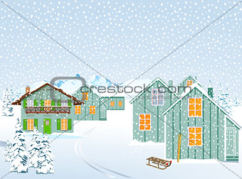 Snowy village in winter landscape in the mountains