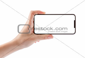 Young girl hand holding black smart phone on white clipping path