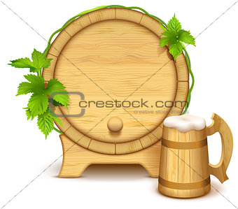 Wooden barrel and full wooden beer mug with thick white foam