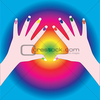 Female hands with multi-colored manicure.