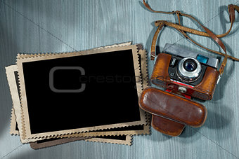 Old Camera and Blank Photo Frames
