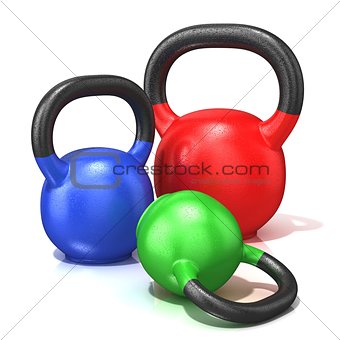 Red, green and blue kettle bells weights isolated on a white bac