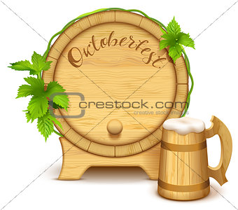 Wooden barrel and full wooden beer mug. Oktoberfest handwritten text
