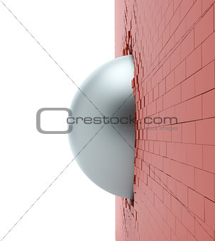 A metal ball in the hole of a brick wall