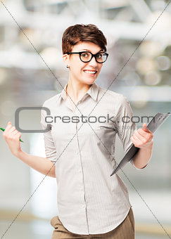Successful happy young woman rejoicing in the office