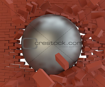 A metal ball broke the brick wall. Close-up