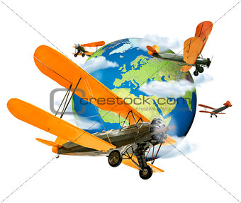 Biplanes flying around the Globe