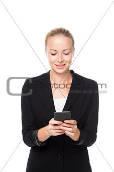 Beautiful young caucasian businesswoman using mobile phone.